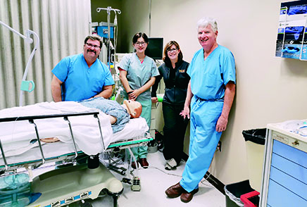 From left: Mike Kammerman, Yuxiao, RN, MScN, Ph.D.-c, Nickie Damico, Ph.D., CRNA, CHSE, and Michael Fallacaro, D.N.S., CRNA, FAAN